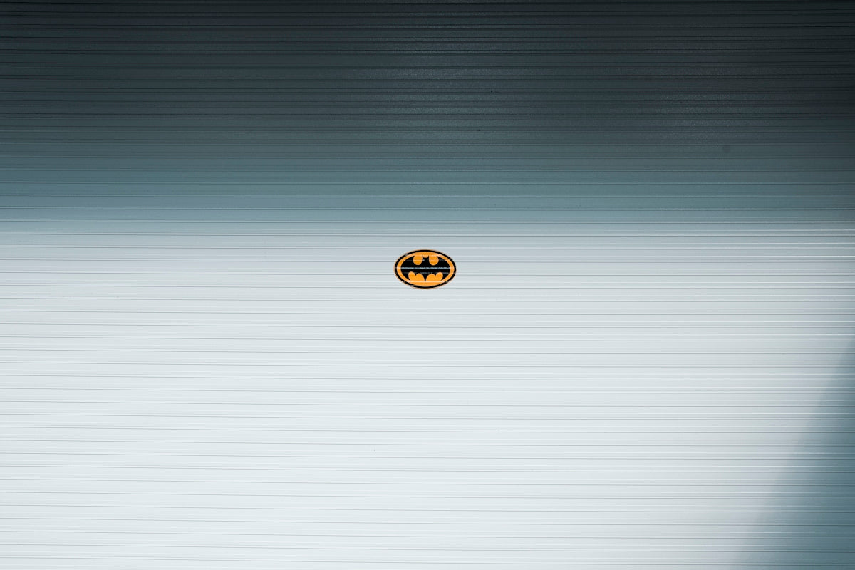 Batman logo placed on white surface