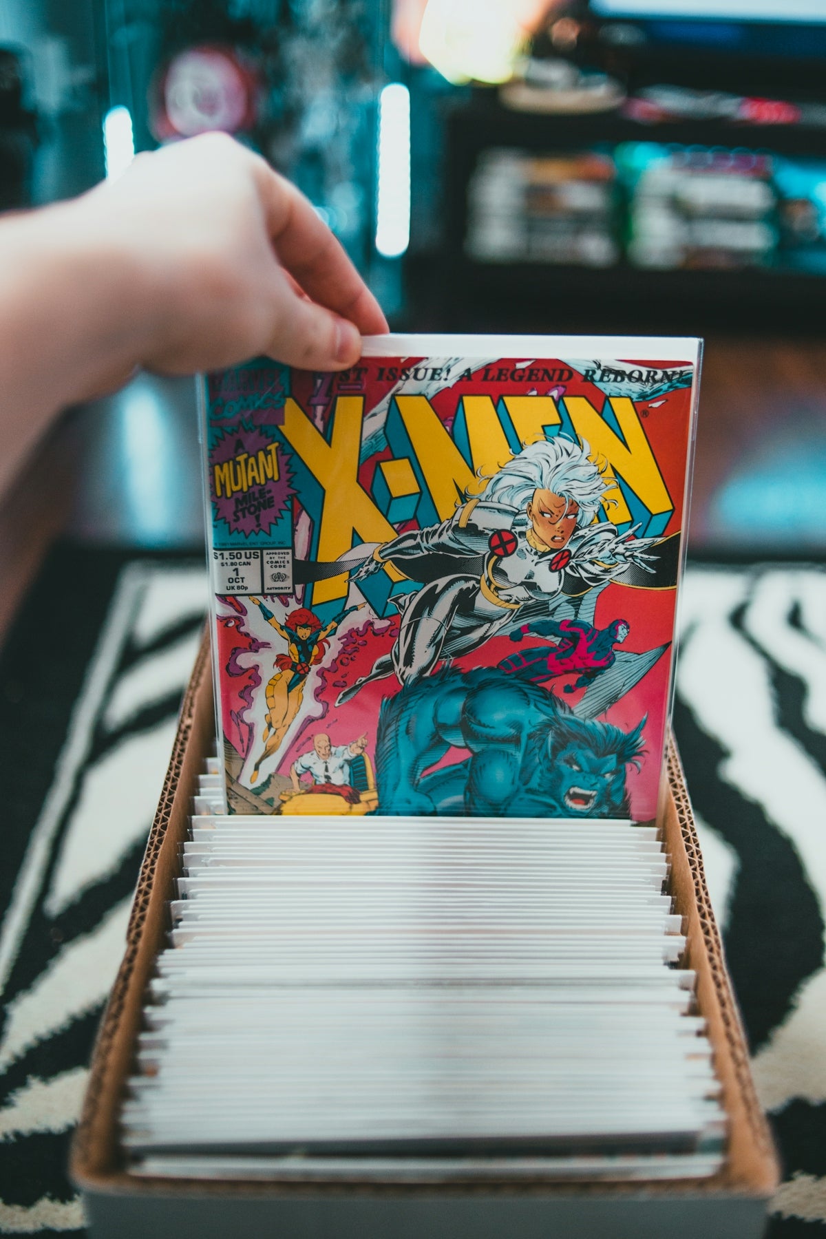 person holding dragon ball z comic book