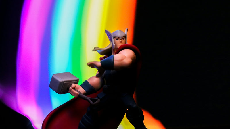 a toy of a man with a hammer in his hand
